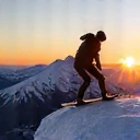 Snowboarder mid-air performing a trick