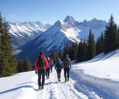Hikers on a snow-covered trail in a national park with majestic mountain views